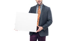 cropped view of businessman in suit holding blank placard, Stock Photo cropped view of businessman in suit holding blank placard, Stock Photo