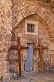 Crosses lean under an arch in the wall of the Church of the Holy Sepulcher in the Christian Quarter of the Old City of Jerusalem stock image Crosses lean under an arch in the wall of the Church of the Holy Sepulcher in the Christian Quarter of the Old City of Jerusalem stock image