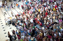 Crowd of people in the airport queue