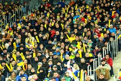 Crowd of people, supporters in a stadium during a football match Royalty Free Stock Photography Crowd of people, supporters in a stadium during a football match Royalty Free Stock Photography