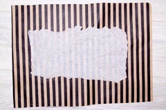 Crumpled paper sheet on striped background with copyspace for text as template food background. Top view. flat lay royalty free stock photo Crumpled paper sheet on striped background with copyspace for text as template food background. Top view. flat lay royalty free stock photo