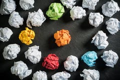 Crumpled paper symbolizing different solutions with some standing out stock images Crumpled paper symbolizing different solutions with some standing out stock images