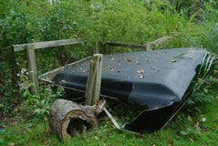 Crushed Old Truck Cap In Forest stock photo Crushed Old Truck Cap In Forest stock photo