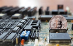 Crypto bitcoin exits from the integrated circuit Stock Photos Crypto bitcoin exits from the integrated circuit Stock Photos