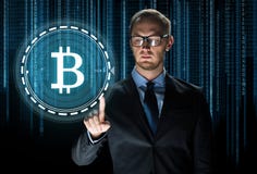 Close up of businessman with bitcoin hologram Stock Photos Close up of businessman with bitcoin hologram Stock Photos