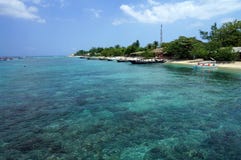 Crystal clear turquoise water along tropical beach stock photos Crystal clear turquoise water along tropical beach stock photos