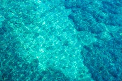 Crystal clear water in the port of Fiskardo, look from above royalty free stock photos Crystal clear water in the port of Fiskardo, look from above royalty free stock photos