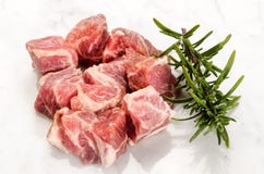Cube pork neck with rosemary on white Royalty Free Stock Photo Cube pork neck with rosemary on white Royalty Free Stock Photo