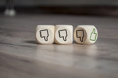 Cubes dice with thumbs up and down stock photo Cubes dice with thumbs up and down stock photo