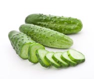 Cucumber. And slices isolated over white background Cucumber. And slices isolated over white background