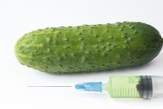 Cucumber And Syringe Stock Photo