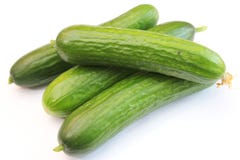 Cucumbers. Some fresh cucumbers on a white background stock images Cucumbers. Some fresh cucumbers on a white background stock images