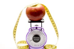 Culinary Scales With Apple Stock Photography