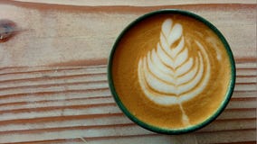 A cup of coffee with latte art royalty free stock images A cup of coffee with latte art royalty free stock images