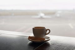 Cup of coffee on the table in airport cafe. royalty free stock photos Cup of coffee on the table in airport cafe. royalty free stock photos