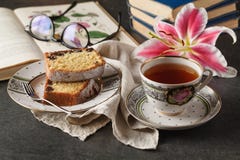 Cup of coffee on wooden table. Vintage books in the background stock images Cup of coffee on wooden table. Vintage books in the background stock images