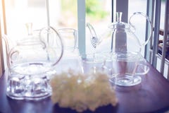 Cup and kettle glass on shelves stock photo Cup and kettle glass on shelves stock photo