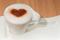 Cup Of Coffee With Cinnamon Heart On Milk Foam Royalty Free Stock Photo
