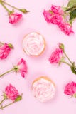 Cupcake With Pink Cream Decoration And Roses On Pink Pastel Background. Royalty Free Stock Image