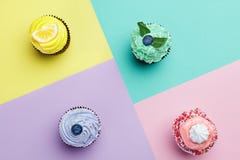 Cupcakes Desserts On Colorful Background Stock Image Cupcakes Desserts On Colorful Background Stock Image