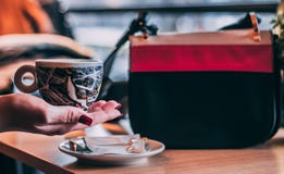 Beautiful woman drinking coffee in a cafe. stock photography Beautiful woman drinking coffee in a cafe. stock photography