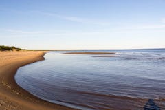 Curves of coastline in summer morning Stock Images Curves of coastline in summer morning Stock Images