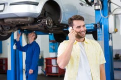 Customer making a phone call stock image Customer making a phone call stock image