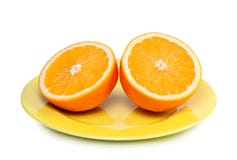 Cut Orange On Plate. Royalty Free Stock Photo