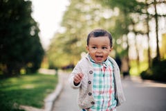 Free Cute African American Toddler Having Fun Outdoors Royalty Free Stock Photography - 53768547