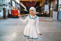 Cute anime style blonde girl with baseball bat stock photography Cute anime style blonde girl with baseball bat stock photography