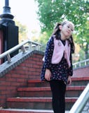 Cute Asian little beautiful girl play at autumn in the city park stock photo Cute Asian little beautiful girl play at autumn in the city park stock photo