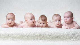 Cute babies on light background royalty free stock image Cute babies on light background royalty free stock image