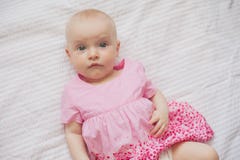 cute baby girl in pink frock