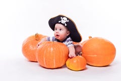 Cute Baby With A Pirate Hat On His Head Lying On His Stomach On Royalty Free Stock Photos Cute Baby With A Pirate Hat On His Head Lying On His Stomach On Royalty Free Stock Photos
