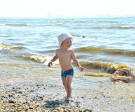 Cute Boy On A Beach Royalty Free Stock Photos