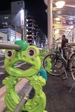 Kyoto, Japan - 2010: Frog shape railing to lock bicycles stock images Kyoto, Japan - 2010: Frog shape railing to lock bicycles stock images
