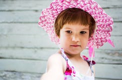Cute girl wearing hat against vintage backdrop stock photography Cute girl wearing hat against vintage backdrop stock photography