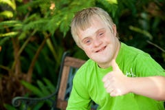 https://thumbs.dreamstime.com/t/cute-handicapped-boy-showing-thumbs-up-outdoors-29459898.jpg