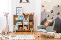 Cute interior of kid room with baby accessories and toys.