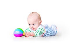 Cute laughing funny baby boy learning to crawl royalty free stock photo Cute laughing funny baby boy learning to crawl royalty free stock photo
