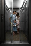 Cute little daughter and her young parents royalty free stock images Cute little daughter and her young parents royalty free stock images