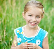 Cute Little Girl On The Meadow Royalty Free Stock Photo