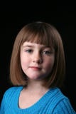 Cute Little Girl With Straight Hair And A Blue Top Stock Photography Cute Little Girl With Straight Hair And A Blue Top Stock Photography
