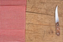 Cutting Breadboard And Knife Over Red Grunge Gingham Tablecloth Stock Photo 38555370 Megapixl
