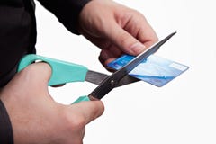 Cutting debts concept - scissors and credit card Royalty Free Stock Photos Cutting debts concept - scissors and credit card Royalty Free Stock Photos