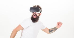 Cyber sport. Guy with head mounted display interact virtual reality. Virtual activity. Hipster play virtual sport game stock images Cyber sport. Guy with head mounted display interact virtual reality. Virtual activity. Hipster play virtual sport game stock images