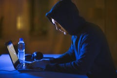 Hacker using laptop computer for cyber attack Royalty Free Stock Image Hacker using laptop computer for cyber attack Royalty Free Stock Image