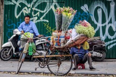 Cykelblommasäljare fotografering för bildbyråer Cykelblommasäljare fotografering för bildbyråer