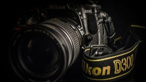 Czarna cyfrowa SLR kamera zdjęcie stock Czarna cyfrowa SLR kamera zdjęcie stock