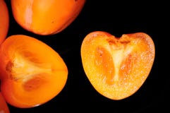 czarny tła persimmon fotografia royalty free czarny tła persimmon fotografia royalty free